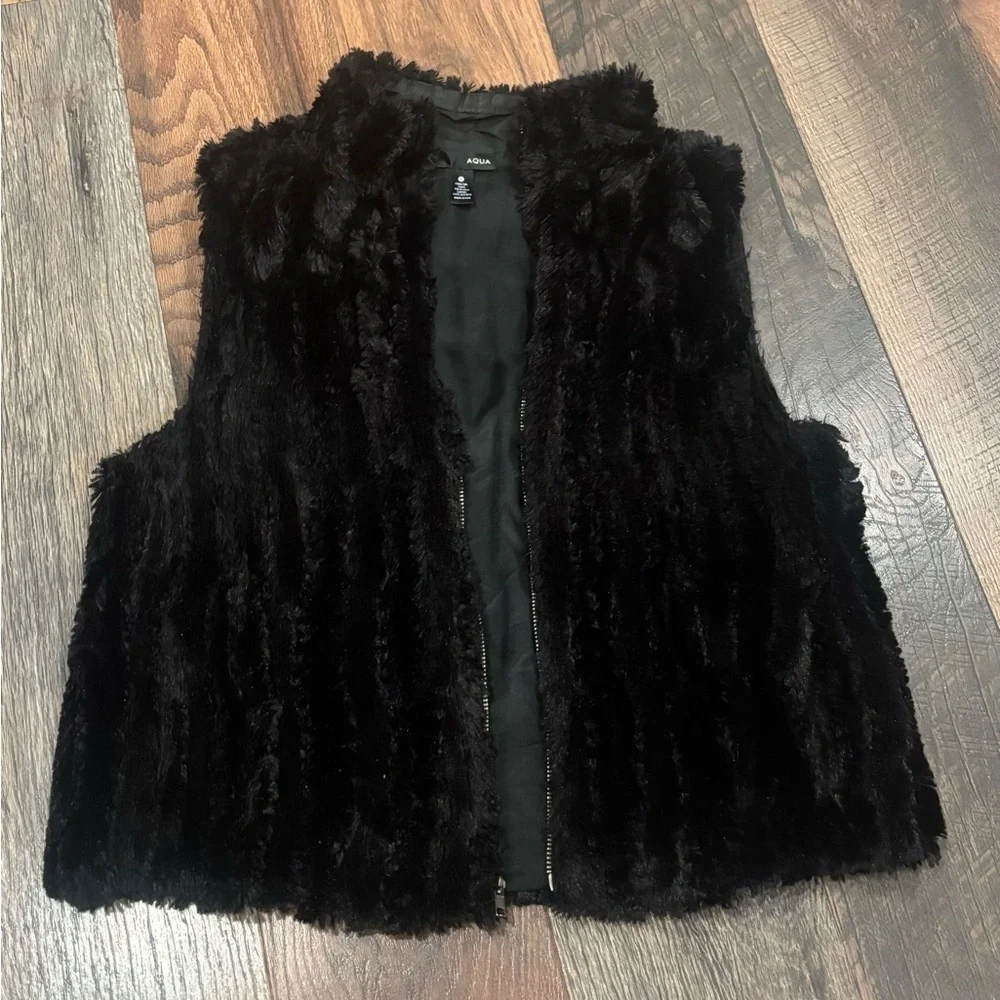 Aqua Bloomingdales  Black Faux Fur Vest size small. Zip up with pockets